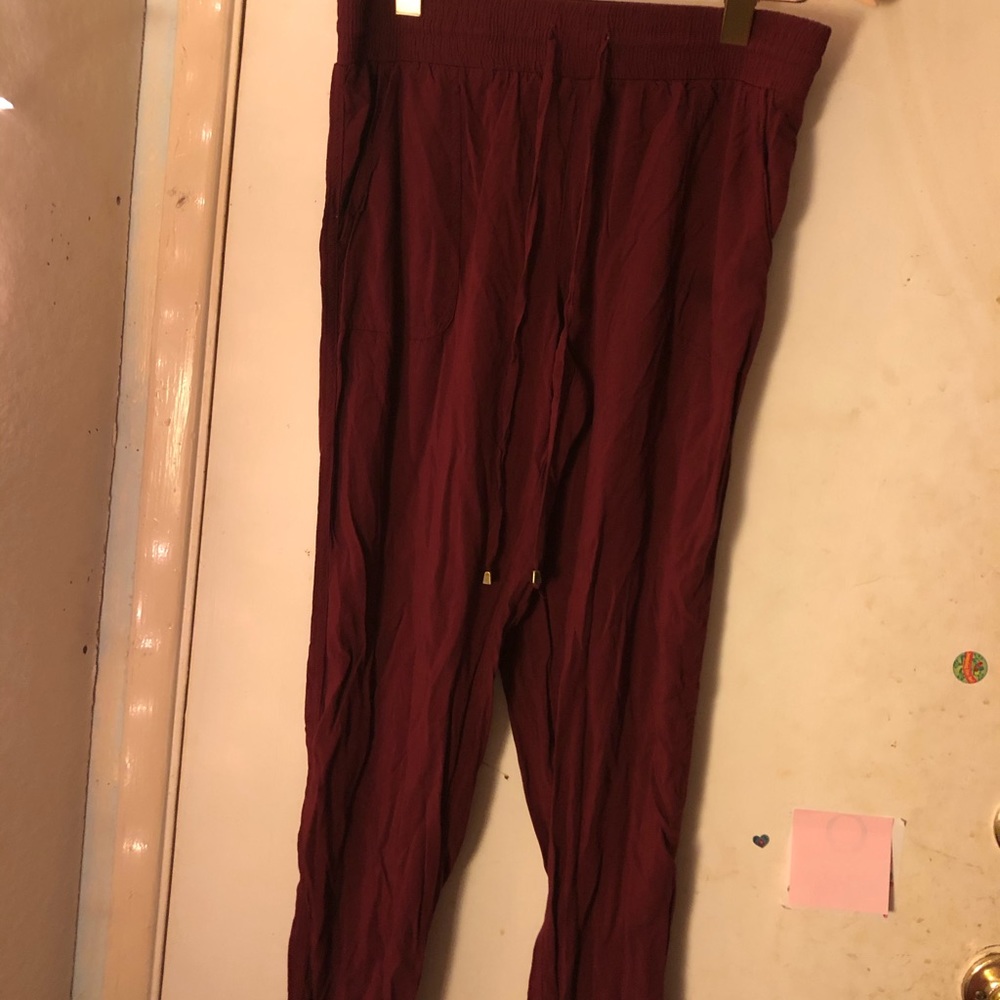 Super cute red pants with gold tie